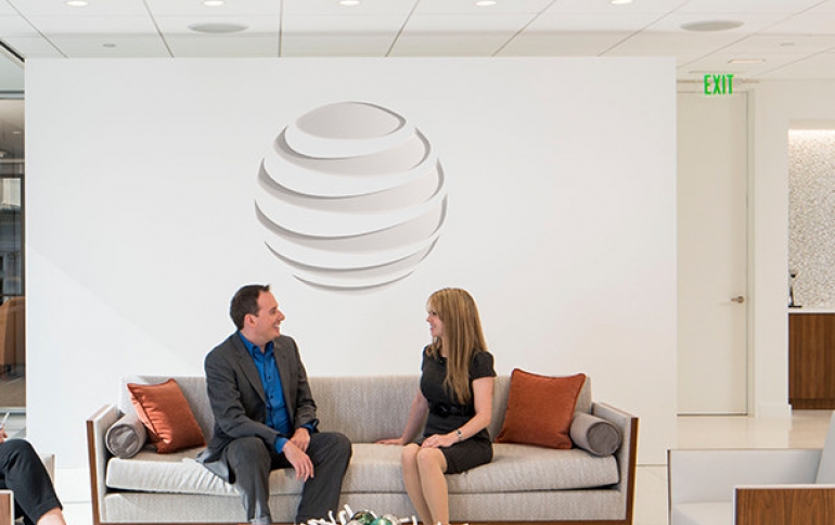 AT&T Revenue Drops 4.5%, Company Withdraws Guidance